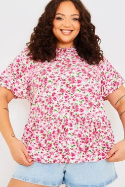 Sustainable Floral Peplum Top